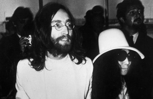 John Lennon and Yoko Ono leaving Amsterdam - 1969 - Photoshot