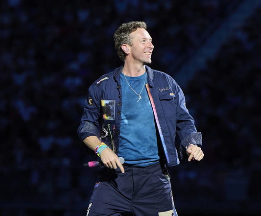 Coldplay's frontman, Chris Martin, delivers a cheeky warning to potential cheaters at recent concert, just before an unexpected viral Kiss Cam moment.