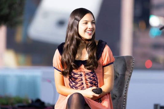 Olivia Rodrigo Opens Up About ‘GUTS’ Pressure & Finding Joy on ‘Sad’ New Album at Grammy Museum