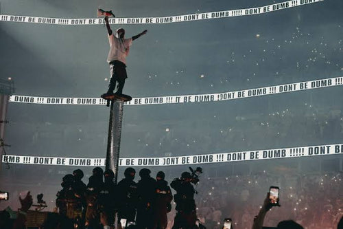 A$AP Rocky Holds Fan’s Sign Seemingly Dissing Drake During Concert: Here’s What It Said